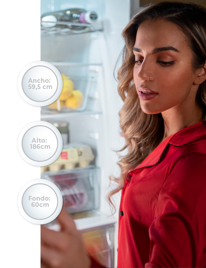 Heladera Top mount de Frost Modelo T643, chica con interior de heladera.